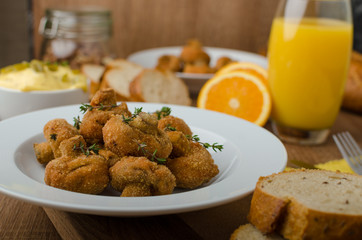 Breaded fried mushrooms with juice