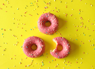 pink donuts with chocolate pieces