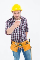 Confident male repairman pointing at you