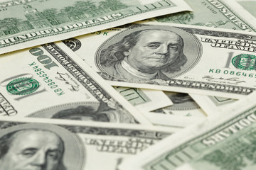 lots of one hundred dollar banknotes, background