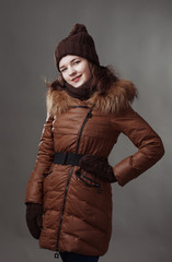 beautiful girl in winter clothes