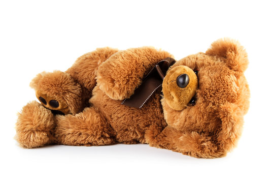 Toy teddy bear lying