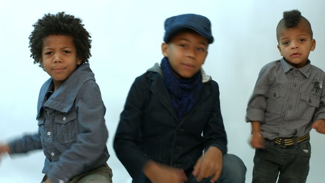 three black boy sings rap and dance