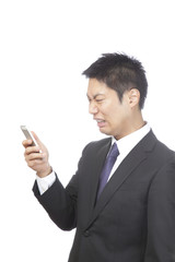 スマホ／男性ビジネスマン