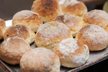 Fresh baked wholewheat bread rolls with crust