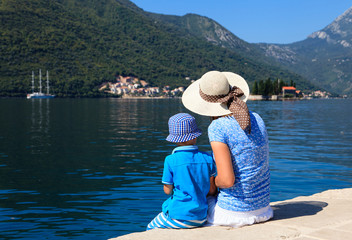 Fototapeta na wymiar mother and son looking at scenic sea view