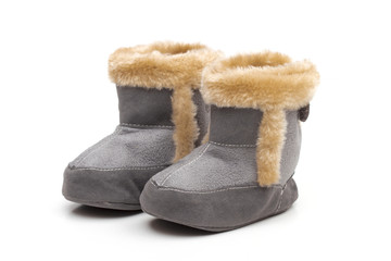 baby's bootees on the white background