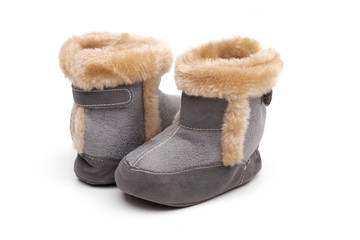 baby's bootees on the white background