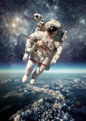 Astronaut in outer space © Andrei Armiagov
