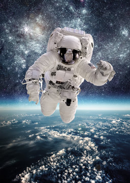 Fototapeta Astronaut in outer space