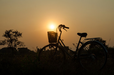 Bicycle with sun set background