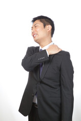 肩こり／男性ビジネスマン