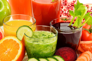 Glasses with fresh organic vegetable and fruit juices