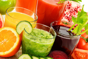 Glasses with fresh organic vegetable and fruit juices