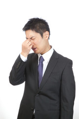 眼精疲労／男性ビジネスマン