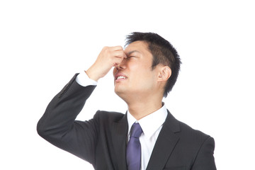 眼精疲労／男性ビジネスマン