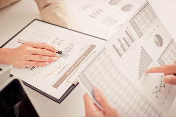 Fototapeta premium Business people discussing the charts and graphs showing the res