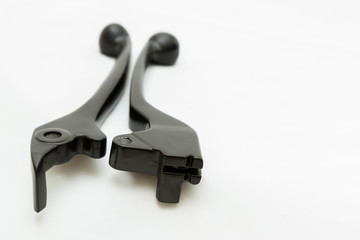 A black motorcycle lever isolated on white