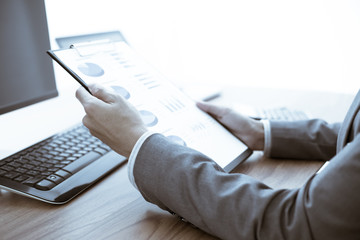 Business people discussing the charts and graphs showing the res