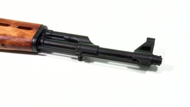 AK 47 beauty-shot close-up on white background with a pan-shot