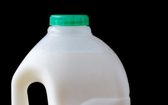 Top of full plastic milk bottle