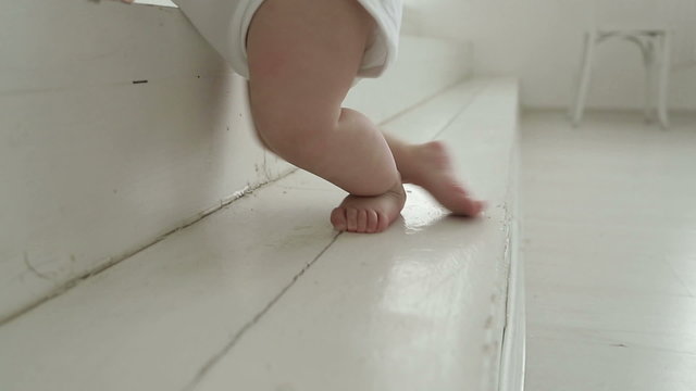 baby crawling on the stairs
