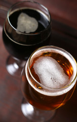 Two glasses of beer in a case