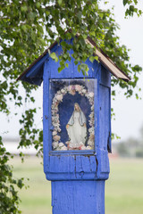 Rural wooden wayside shrine