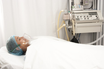 Beautiful patient receives anaesthetic