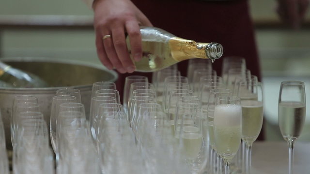 Many glasses of champagne on the table