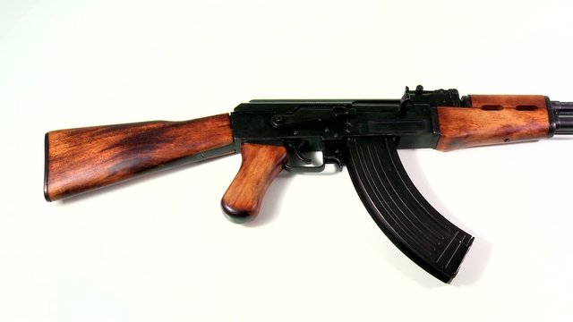AK 47 beauty-shot, knee-shot of the body section with a slow pan
