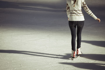 Young girl at the ice rink