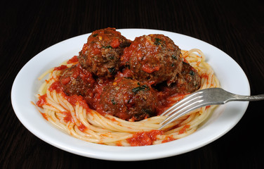 Meatballs in tomato sauce with spaghetti