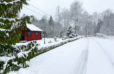 Winter landscape of Swedish village road