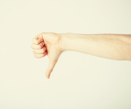 man showing thumbs down