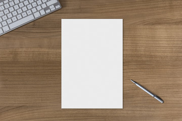 Blank sheet on a wooden table