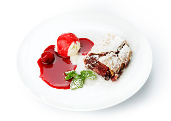 Restaurant food isolated - cherry strudel with ice cream and sau