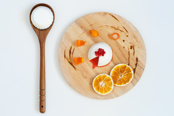 top view of the panna cotta with cranberries and orange