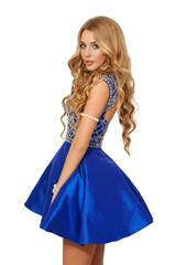 The young blonde girl in a blue