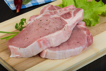 Raw t-bone steak
