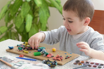 boy with plasticine