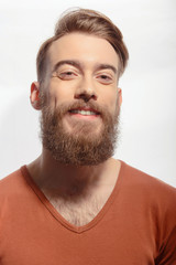 Obraz premium Handsome bearded man posing on white