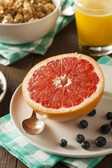 Fototapeta na wymiar Healthy Organic Grapefruit for Breakfast