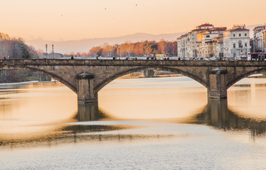 sunset on the river in Florence