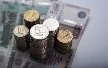 stacks of Russian rubles with note
