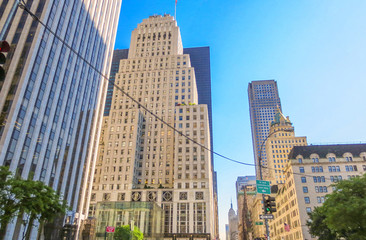 Fototapeta na wymiar Tall buildings of Manhattan with sunset light