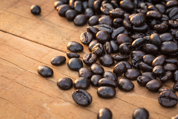 Coffee beans on wood background