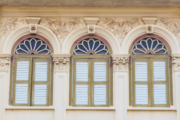 Fototapeta na wymiar Vintage window or Sino-Portuguese style in Phuket, Thailand