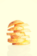 One sliced potatoe. Stack composition.