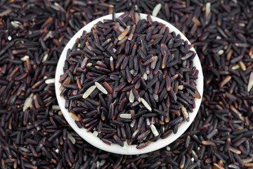 rice berry in bowl on white background